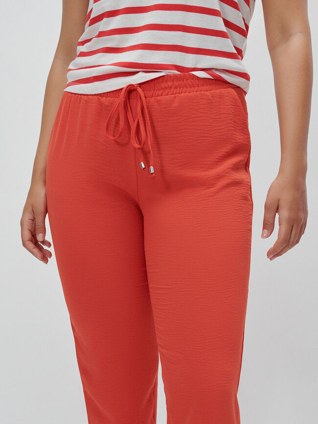 PANTALON JOGGER BOLSILLOS naranja coral